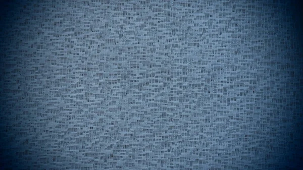 Sheer blue net-like tulle. Mesh fabric. Close-up. Veil or muslin. Close-up of a curtain with different sized holes. Abstract background. Dark vignetting around the edges