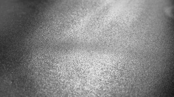 Abstract gray background with gradient, coarse grain. Selective focus. Blurred backdrop with dots and glow. — Stock Photo, Image