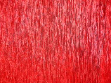 Kırmızıyla işaretlenmiş kağıt. Olaysız bir yüzey. Soyut arkaplan. Kağıt yaprağın dalgalı kenarları. Işık eğrisi.