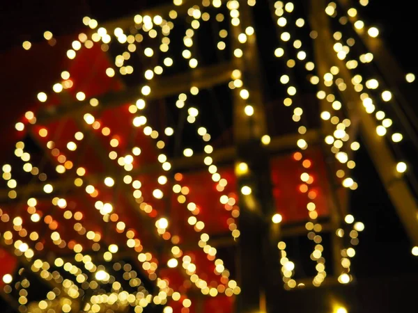 Noel Gecesi Bokeh Güzel Yuvarlak Bokeh Röfleleri Kırmızı Sarı Altın — Stok fotoğraf