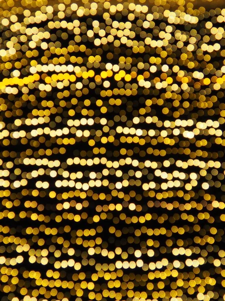Bokeh Röfleleri Karanlıkta Sarı Altın Rengi Yanıp Sönüyor Şenlik Arka — Stok fotoğraf