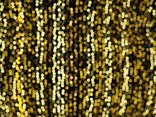 Bokeh Röfleleri Karanlıkta Sarı Altın Rengi Yanıp Sönüyor Şenlik Arka — Stok fotoğraf