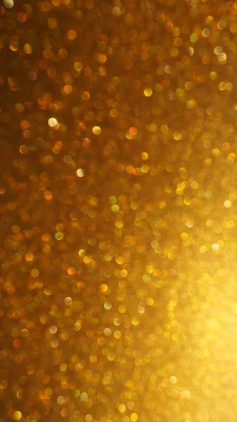 金の輝きのボケの光 金色の輝きの質感の背景 スパンコールと輝きの輝くキラキラ包装紙 祭りの黄金のボケと輝き 美しい背景 — ストック写真