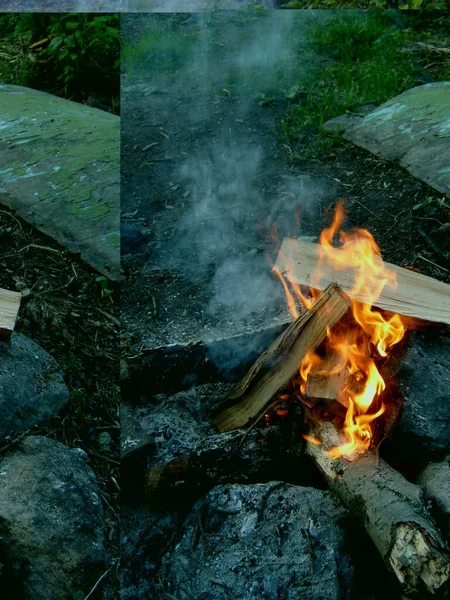 Leña quemada en un incendio. Luminoso fuego. Lenguas de llama de color naranja —  Fotos de Stock