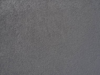 Gri arka plan. Alçıyla kaplanmış gri ya da siyah duvar. Sert bir doku. Kadife etkisi. Duvarların, iç mekanların, binaların ve binaların ön cephelerinin profesyonelce bitirilmesi. İnşaat ve tasarım.
