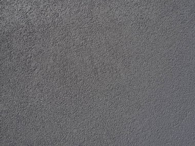 Gri arka plan. Alçıyla kaplanmış gri ya da siyah duvar. Sert bir doku. Kadife etkisi. Duvarların, iç mekanların, binaların ve binaların ön cephelerinin profesyonelce bitirilmesi. İnşaat ve tasarım.