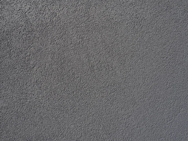Gri arka plan. Alçıyla kaplanmış gri ya da siyah duvar. Sert bir doku. Kadife etkisi. Duvarların, iç mekanların, binaların ve binaların ön cephelerinin profesyonelce bitirilmesi. İnşaat ve tasarım.