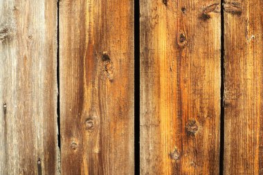 Tahtayı doğal dokuyla kapat. Boş tahta şablon tahtası üst görünüm ürün görüntüsü veya montaj için bir zemin olarak kullanılabilir. Yüksek kalite fotoğraf. Düğümsüz dikey kahverengi panolar.