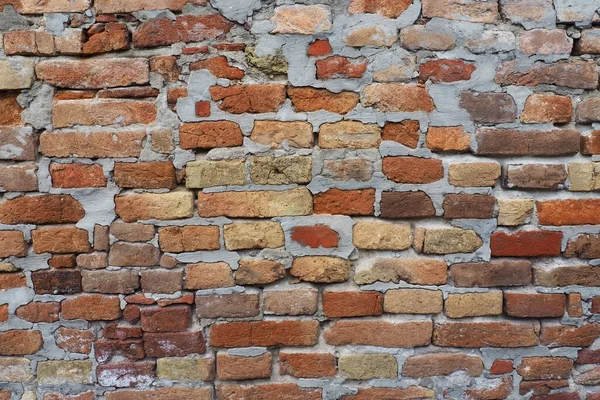 Cegła Ściana Starożytnej Twierdzy Nierówne Czerwone Brązowe Cegły Cementem Tło — Zdjęcie stockowe