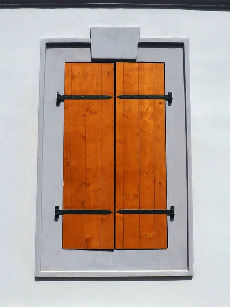 Window Old Wooden Shutters Metal Curly Braces White Wall Country — Fotografia de Stock