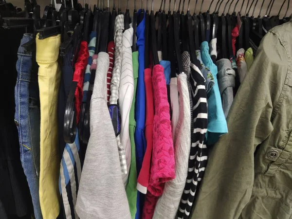 Clothes Hung Hangers Assortment Second Hand Store Children Women Shirts — Stok fotoğraf