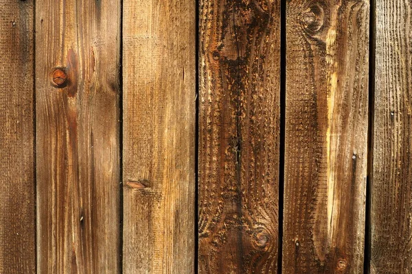 Close up wood with natural texture. The blank wooden template board can be used as a backdrop for top view product display or montage. High quality photo. Vertical brown boards with knots without gaps — Stock Photo, Image