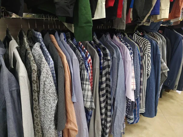 Clothes Hung Hangers Assortment Second Hand Store Men Shirts Hanging — Stok fotoğraf