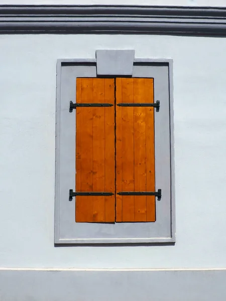 Window Old Wooden Shutters Metal Curly Braces White Wall Country — Stok Foto