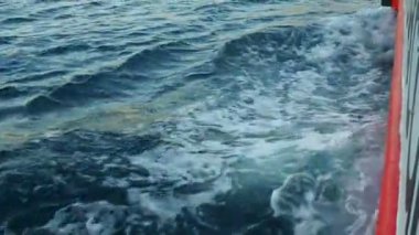 Boka Kotor Adriatic Sea, Verige Strait Kamenari Lepetane Ferry Line Trajekt Ferryboat for passenger, cargo and vehicles. Water seethes from under the ship. Whirlpool waves and bubbles. August 16 2022