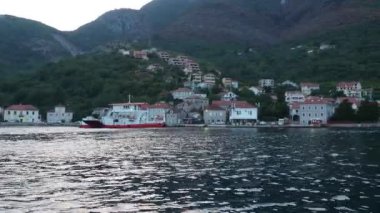 Boka Kotor Adriatic Sea, Verige Strait Kamenari Lepetane Ferry Line Trajekt. Ferryboat for passenger, cargo and vehicles. Tourism and business in Montenegro Maritime transport coastal. August 16 2022