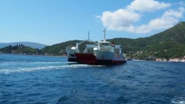 Boka Kotor Adriatic Sea, Verige Strait Kamenari Lepetane Ferry Line Trajekt. Ferryboat for passenger, cargo and vehicles. Tourism and business in Montenegro Maritime transport coastal. August 16 2022