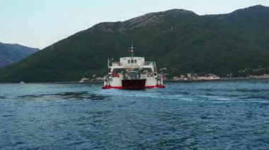 Boka Kotor Adriatic Sea, Verige Strait Kamenari Lepetane Ferry Line Trajekt. Ferryboat for passenger, cargo and vehicles. Tourism and business in Montenegro Maritime transport coastal. August 16 2022