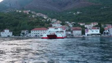 Boka Kotor Adriatic Sea, Verige Strait Kamenari Lepetane Ferry Line Trajekt. Ferryboat for passenger, cargo and vehicles. Tourism and business in Montenegro Maritime transport coastal. August 16 2022