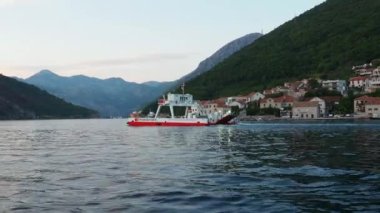 Boka Kotor Adriatic Sea, Verige Strait Kamenari Lepetane Ferry Line Trajekt. Ferryboat for passenger, cargo and vehicles. Tourism and business in Montenegro Maritime transport coastal. August 16 2022