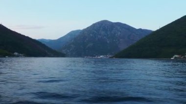 Boka Kotor Adriatic Sea Verige Strait Kamenari Lepetane Ferry Line Trajekt. Strait between two mountains. The tourist ship sails. Tourism and business in Montenegro Maritime and water. August 16 2022.