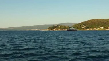 Boka Kotor Adriatic Sea, Verige Strait Kamenari Lepetane Ferry Line Trajekt. Ferryboat for passenger, cargo and vehicles. Tourism and business in Montenegro Maritime transport coastal. August 16 2022