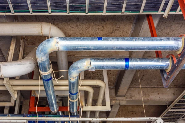 Steel pipe in factory construction site — Stock Photo, Image