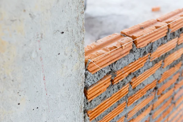 Brick wall construction for house building — Stock Photo, Image