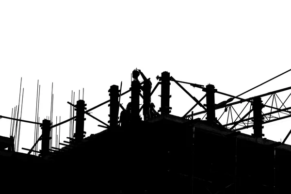 Silhouette labor working in construction site — Stock Photo, Image