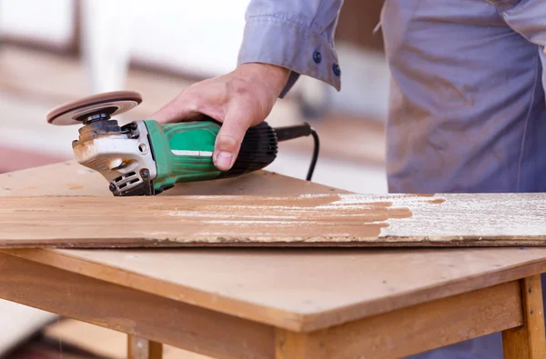 Carpenter plane wood for house construction — Stock Image Carpenter plane wood for house construction Stock Picture