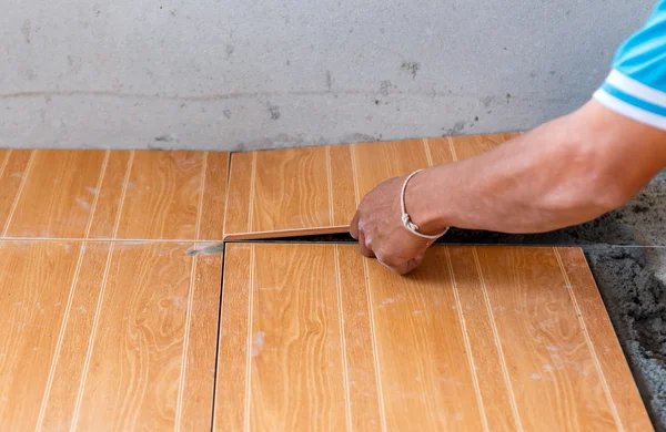 Floor tile installation for house building — Stock Photo, Image