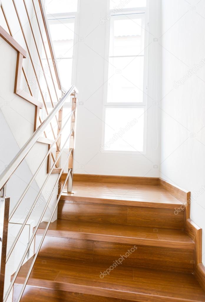 Interior wooden staircase of new house