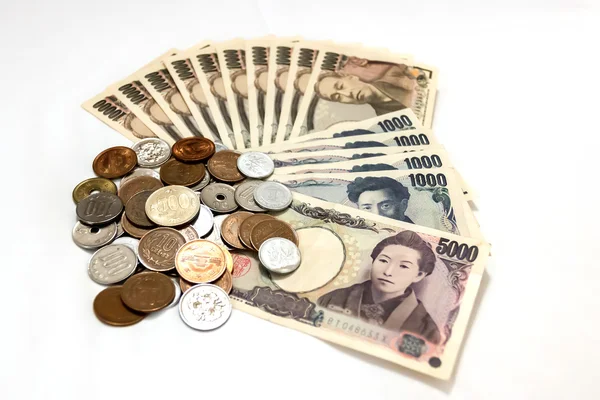 Япония деньги на белом фоне — стоковое фото