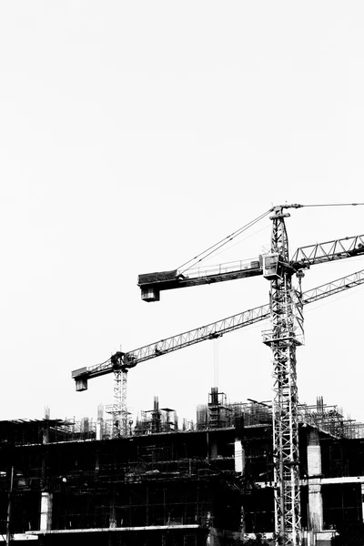 Építkezés, daruk, silhouette háttér — Stock Fotó
