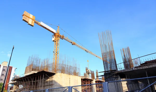 Construction site with cranes working — Stock Photo, Image