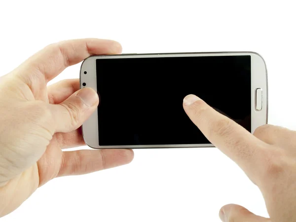 Main tenant un smartphone blanc moderne — Photo