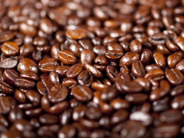 Background of freshly dark roasted coffee beans — Stock Photo, Image