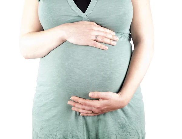 36 Wochen schwangere junge Frau hält ihren Bauch — Stockfoto