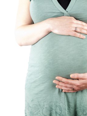 36 hafta hamile genç kadının beline tutarak