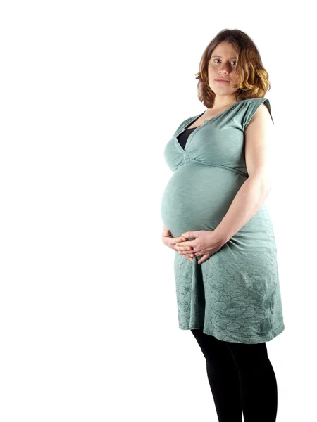 36 hafta hamile genç kadının beline tutarak Stok Resim