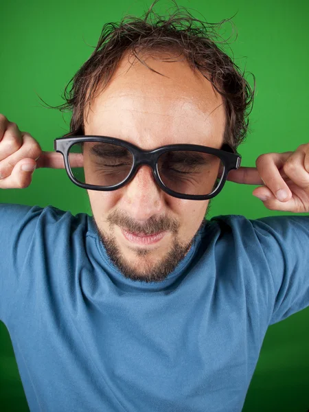 Thirty year old man with 3d glasses is too afraid to watch the movie — Stock Photo, Image