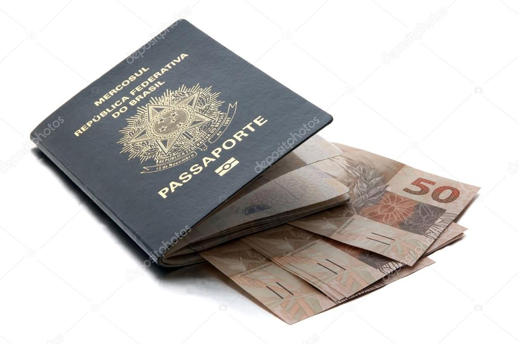 Brazilian passport and brazilian currency (Real)