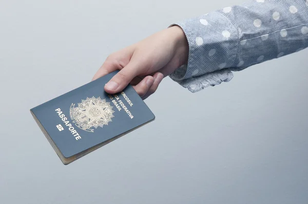 Caucasian Woman holding a brazilian passport — Stock Photo, Image