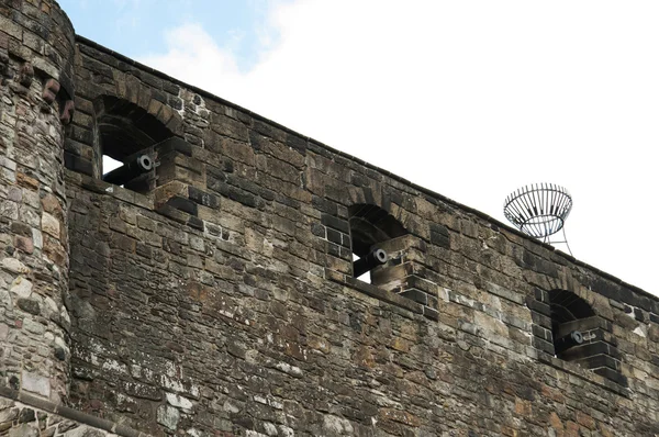 Cannons at Stone Wall in Edinburgh Castle Stock Photo