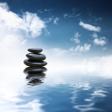 Zen stones over water clipart