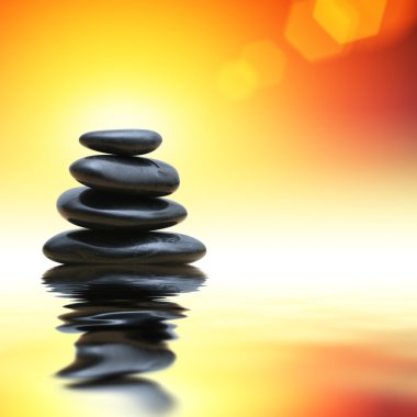 Zen taşların üzerinde parlama arka plan