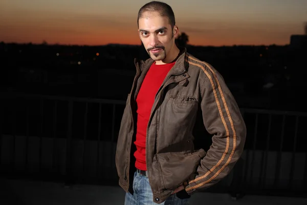 Handsom man in brown jacket outdoors — Stock Photo, Image