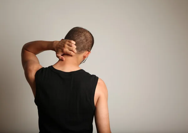 Man scratching back of the head — Stock Photo, Image