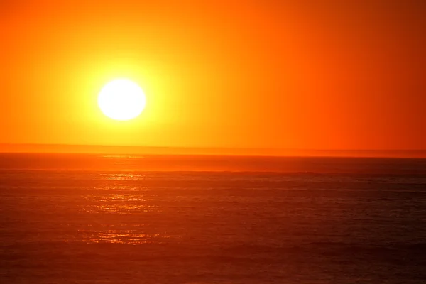 Sunset over ocean — Stock Photo, Image