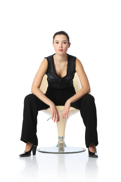 Businesswoman in chair — Stock Photo, Image